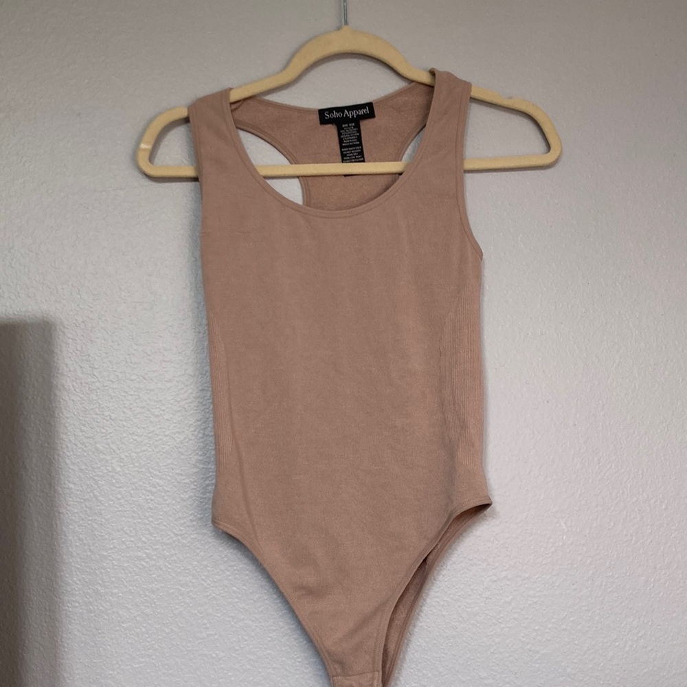 Tan body suit